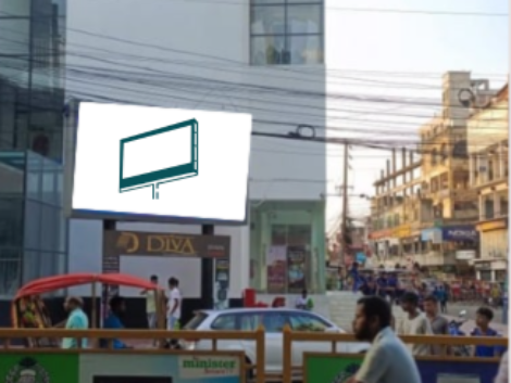 A vibrant digital billboard at Police Plaza, Bogura, showcasing dynamic advertisements to capture the attention of both foot and vehicle traffic in a high-traffic area.